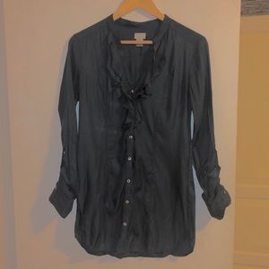 Long blue ruffle blouse